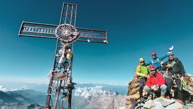 LHOer Omran Antar and Jad Mneimneh with IFMGA guides Philippe Genin and Babis Marinidis on the summit of the Matterhorn during the Climb Matterhorn Course with the Life Happens Outdoors team.