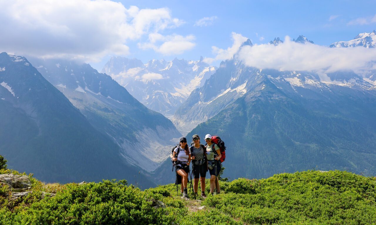 LHO trekkers descending from Lac Blanc towards Argentière during the Tour du Mont Blanc.