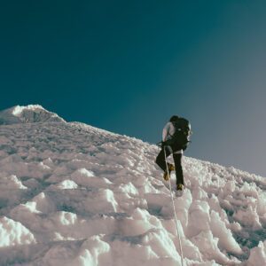 LHO climber Zeid Shair ascending the second set of fixed ropes on the way to the summit of Lobuche East, surrounded by.