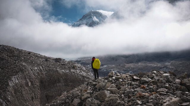 The Life Happens Outdoors team trekking on the moraine of the Khumbu Glacier between Lobuche and Everest Base Camp during the Everest Base Camp Trek.