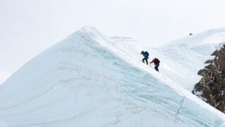 Ascending the third mogul before the summit ridge during the Mont Blanc Summit Climb course with the Life Happens Outdoors team.