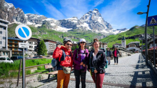 LHOers in Cervinia with the Italian side of the Matterhorn in the backdrop before boarding the gondola to do the glacier crossing back to Zermatt during the Chamonix to Zermatt Haute Route Expedition with the Life Happens Outdoors team.