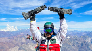 Image from the summit of Aconcagua Expedition featuring Hari Budha Magar, the first double over-the-knee amputee to climb Everest, as he takes on the challenging ascent of South America's highest peak.