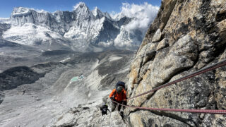 Tony Aoun crossing the Yellow Tower on the way to Camp 2 during the Climb Ama Dablam Expedition with the Life Happens Outdoors team.