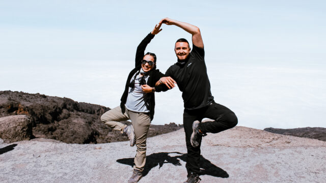 Life Happens Outdoors climbers on Kilimanjaro’s Machame Route celebrating the successful ascent of the Barranco Wall.