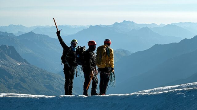 Looking down at the Chamonix Valley from the top of the Aiguille du Goûter during the Mont Blanc Summit Climb course with the Life Happens Outdoors team.
