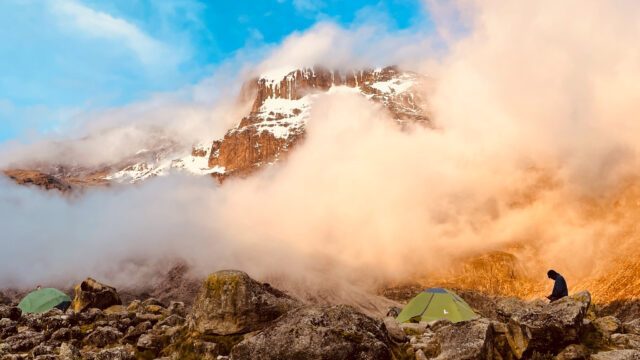 The summit of Kilimanjaro as seen from Barranco Camp on the Machame Route during the Climb Kilimanjaro Expedition with the Life Happens Outdoors team.