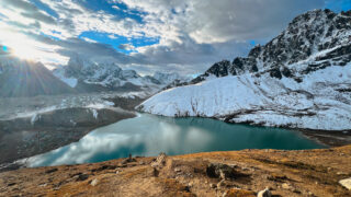 The Gokyo Lakes with the Gokyo Valley in the background as the Life Happens Outdoors team descends from Gokyo Ri during the Gokyo Lakes Trek, one of the best treks for views of Mount Everest.