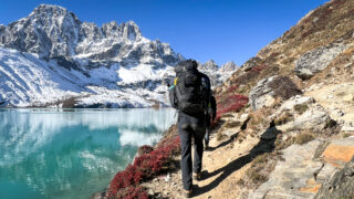 The Life Happens Outdoors team walking next to the Gokyo Lakes during the Gokyo Lakes Trek, one of the best treks for views of Mount Everest.