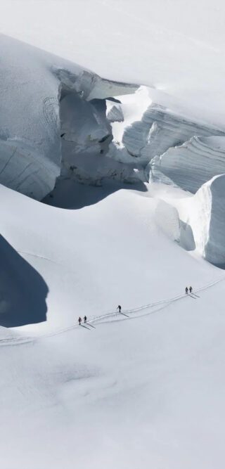 Crossing the Col de Lys between Italy and Switzerland on the way to the Capanna Margherita during the Spaghetti Tour Expedition, climbing the 4000-meter summits of the Monte Rosa Massif with the Life Happens Outdoors team.