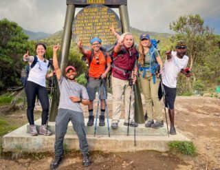 Life Happens Outdoors trekkers at the gate to climb Kilimanjaro