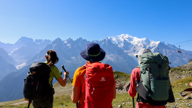 The Life Happens Outdoors team looking at the summit of Mont Blanc from the Flégère region above the Chamonix Valley during the Mont Blanc Summit Course.