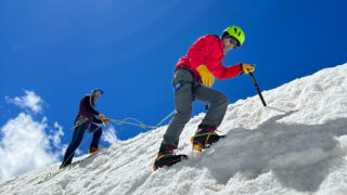 Training to use a mountaineer's ice axe during the Mont Blanc Summit Course with the Life Happens Outdoors team.