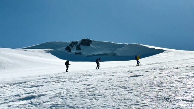 Ascending the face of the Dôme du Goûter during the Mont Blanc Summit Course with the Life Happens Outdoors team.