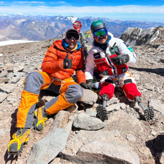 LHO founder Rami Rasamny and Hari Budha Magar, the first double over-the-knee amputee to climb Everest, on the summit of Aconcagua on February 22, 2025, during the Aconcagua Expedition with the Life Happens Outdoors team.