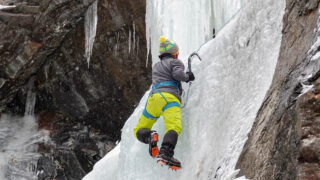 LHOer scaling a waterfall in Cogne during the Ice Climbing in Cogne adventure with the Life Happens Outdoors team.