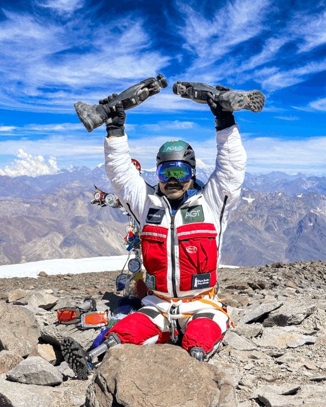 Hari Budha Magar on the summit of Aconcagua with Life Happens Outdoors, becoming the first double over the knee amputee to summit Aconcagua.