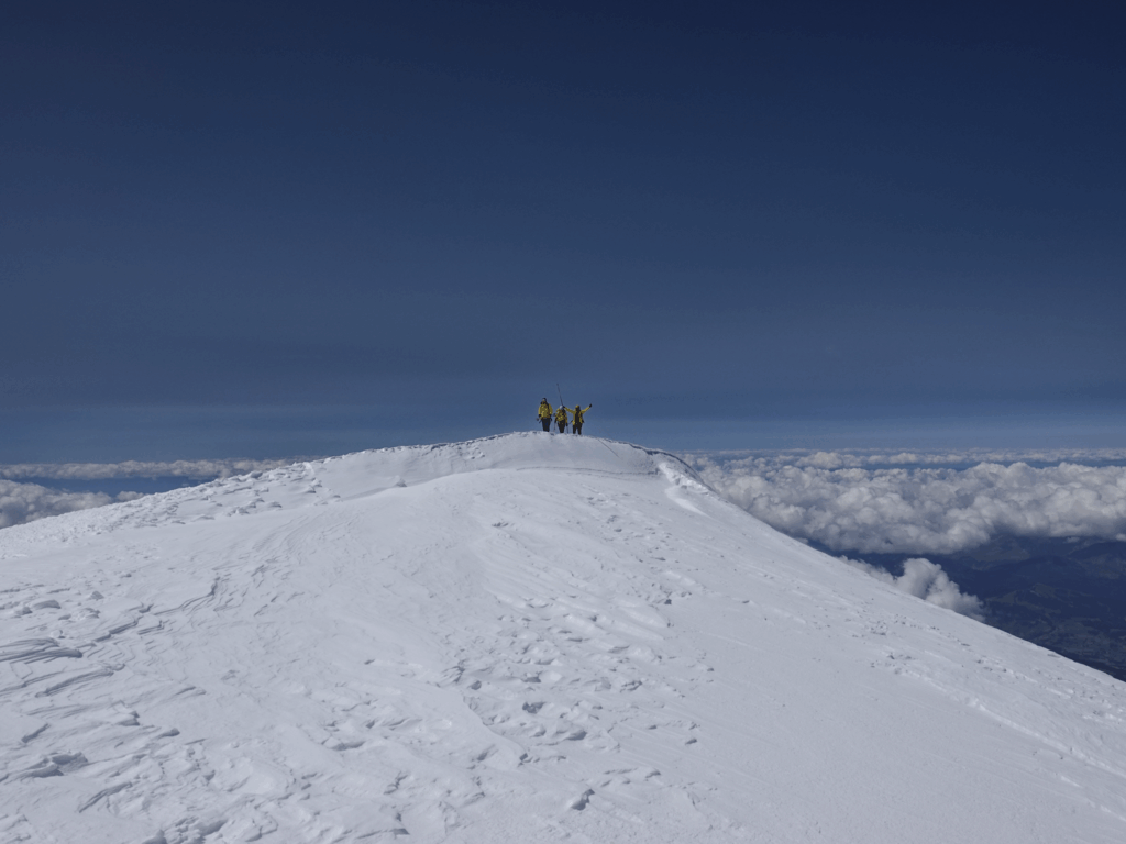 Life Happens Outdoors team reaches the Mont Blanc summit while exiting the summit ridge
