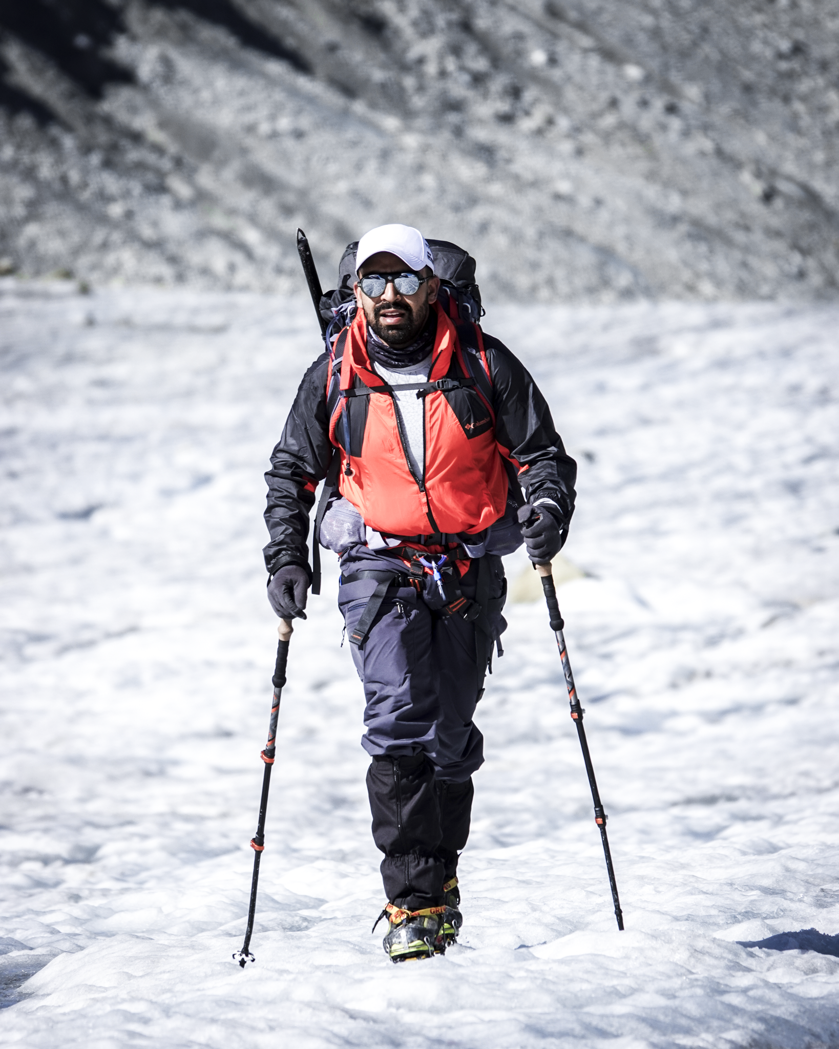 Life Happens Outdoors community member stepping onto a glacier for the first time during an introductory Alps experience.