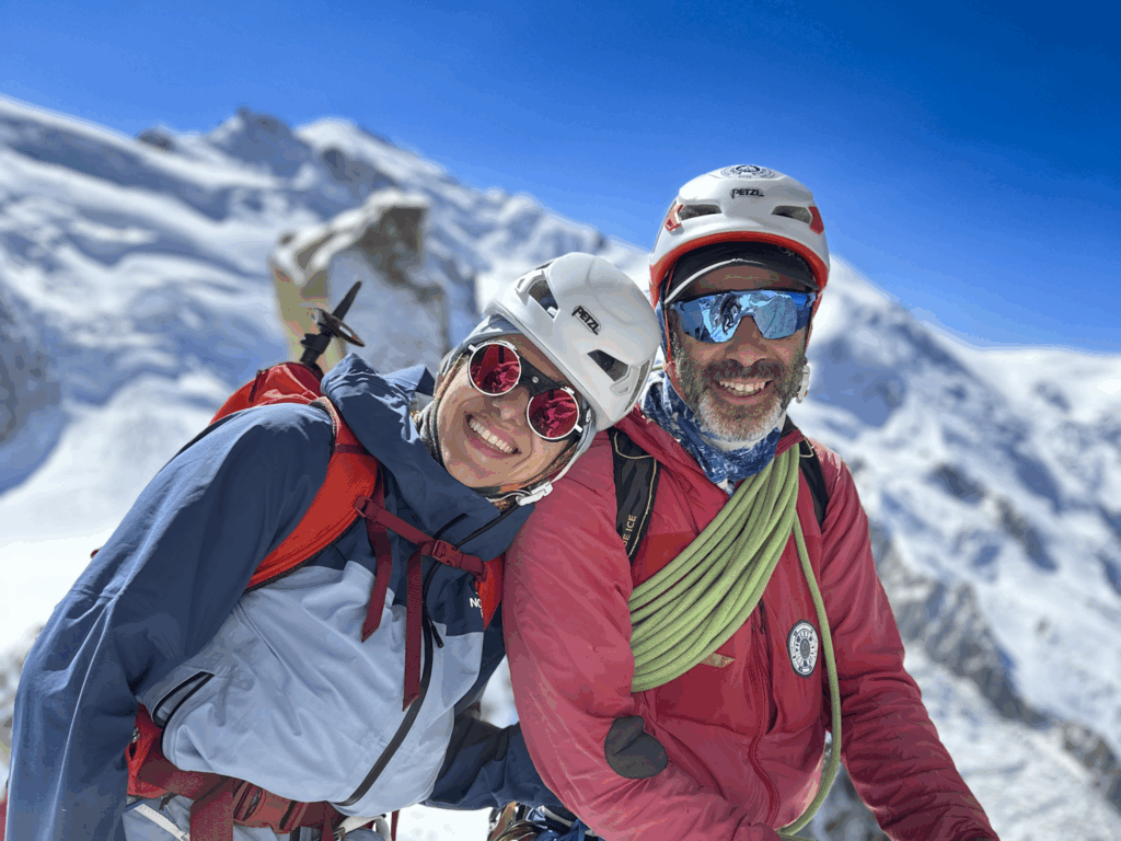 Life Happens Outdoors Team Leader and guide climbing in the Vallée Blanche together, working as one team.