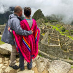 Life Happens Outdoors community member couple looking at Machu Picchu after completing a long trek on the Inca Trail.