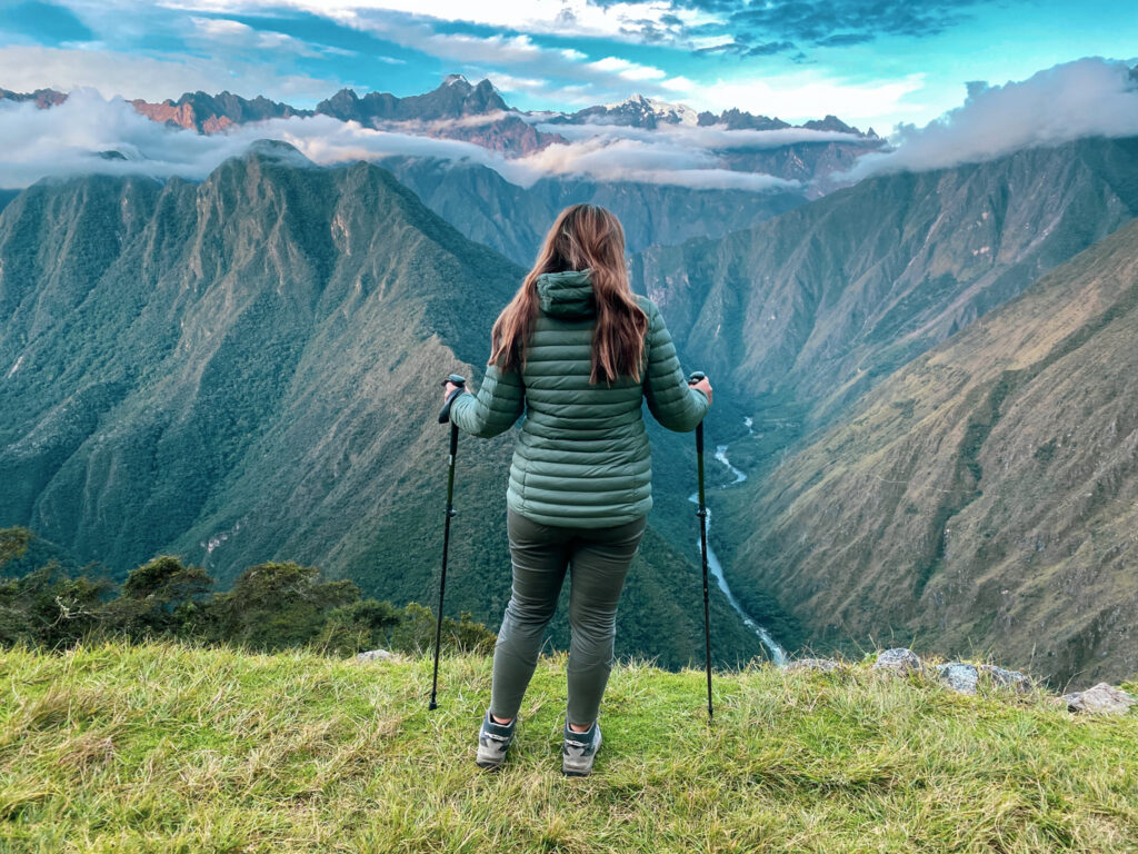 Life Happens Outdoors community member on the Machu Picchu trail looking over a valley at the end of a long trekking day.