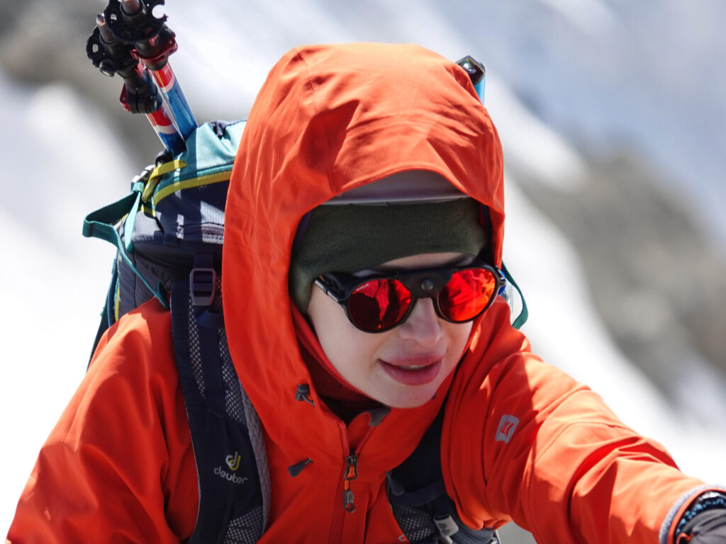 Mountaineer with alpine gear on a guided Mont Blanc climb
