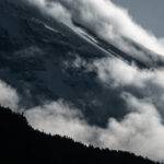 Dramatic clouds on Kilimanjaro crater slopes seen from Machame Camp on the Machame Route