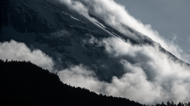 Dramatic clouds on Kilimanjaro crater slopes seen from Machame Camp on the Machame Route