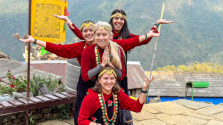 Life Happens Outdoors community members wearing traditional dress during a cultural experience in Nepal