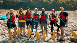Group enjoying a white water rafting adventure in Nepal with Life Happens Outdoors