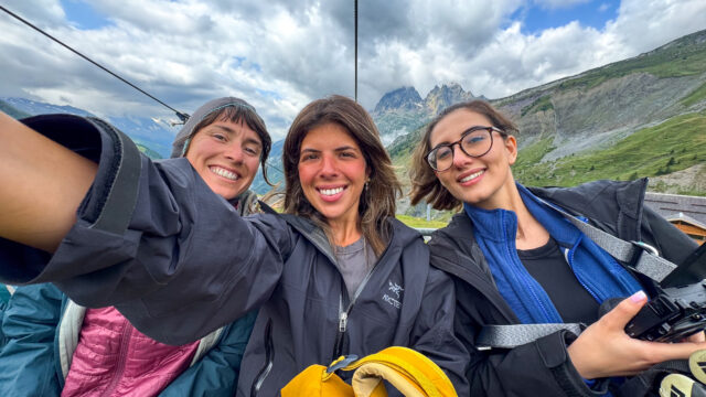 Three Life Happens Outdoors trekkers riding a chairlift during the Tour du Mont Blanc trek