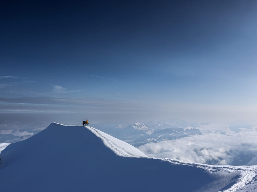 Snow ridge high on Mont Blanc during a summit course