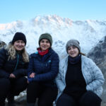 Life Happens Outdoors trekkers in Nepal with snowy Himalayan mountains during the best time to visit Nepal