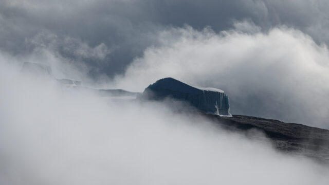 Glacier like ice formations on the upper mountain of Kilimanjaro in cloud.