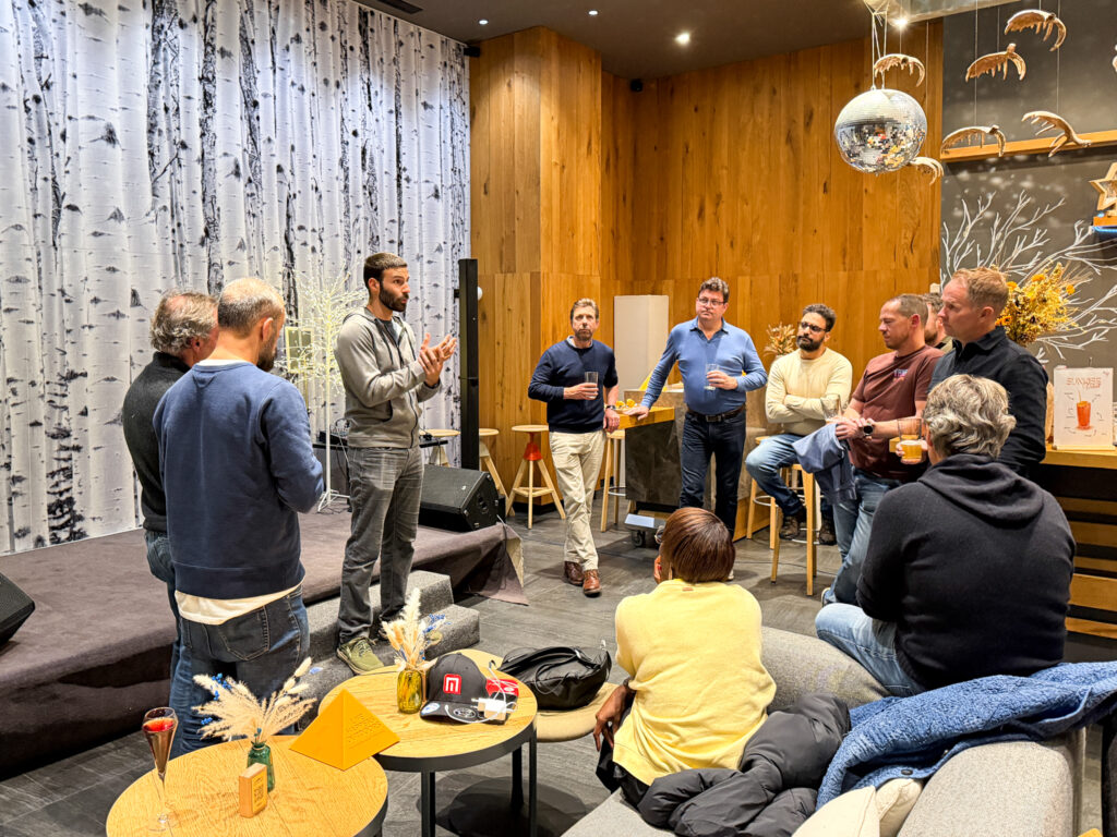 Market Securities team members during an indoor briefing on their Life Happens Outdoors Chamonix executive offsite.
