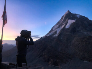 Sunrise view of the Matterhorn from a mountain hut during an alpine trekking journey with Life Happens Outdoors